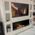 Foco One 1500 media wall cheminée bioéthanol encastrable avec cadre noir et verre de sécurité.
