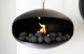 24 galets de céramique noirs, une élégante décoration de cheminée bio qui rend le feu encore plus invitant.